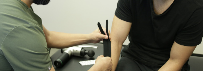 Chiropractor Aliso Viejo CA Salman Khanaki and Kinesio Taping